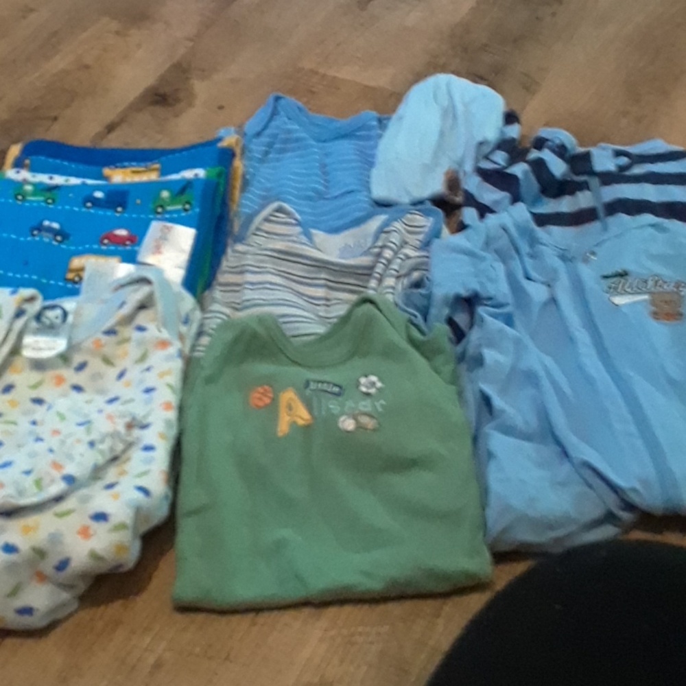 Lot of newborn boy onsies, sleepers and burp cloth